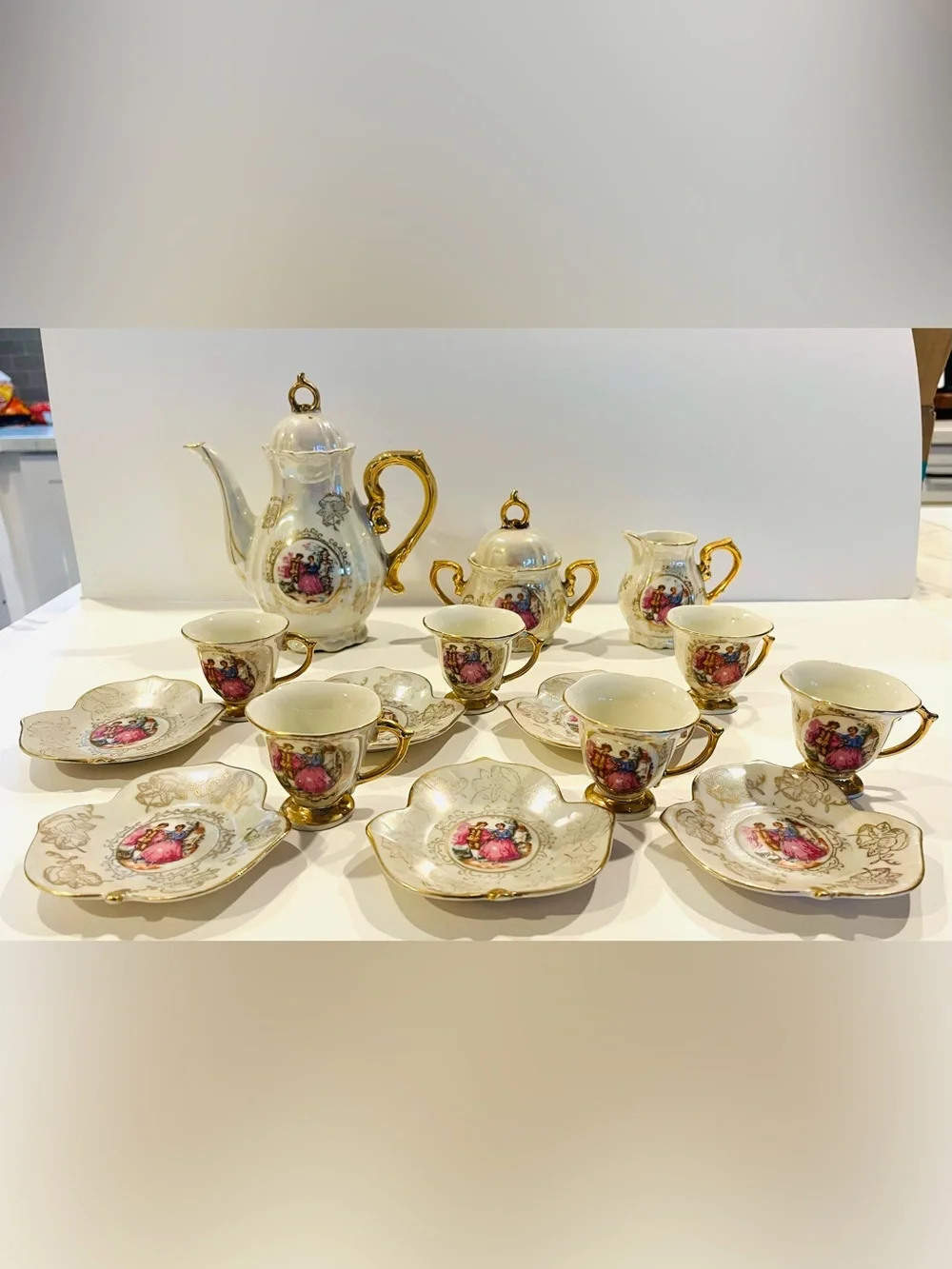 vintage porcelain tea service set from Japan features an iridescent finish